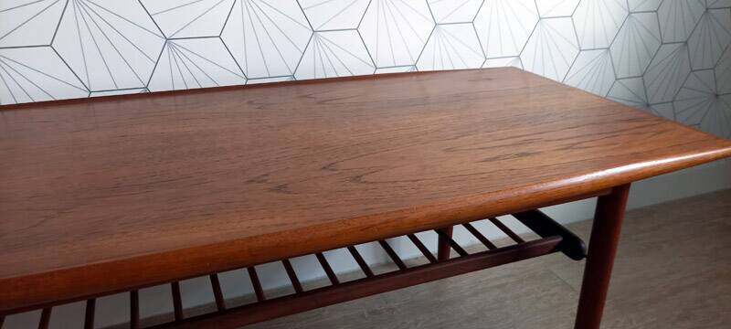Danish 1960s teak coffee table with slatted shelf.