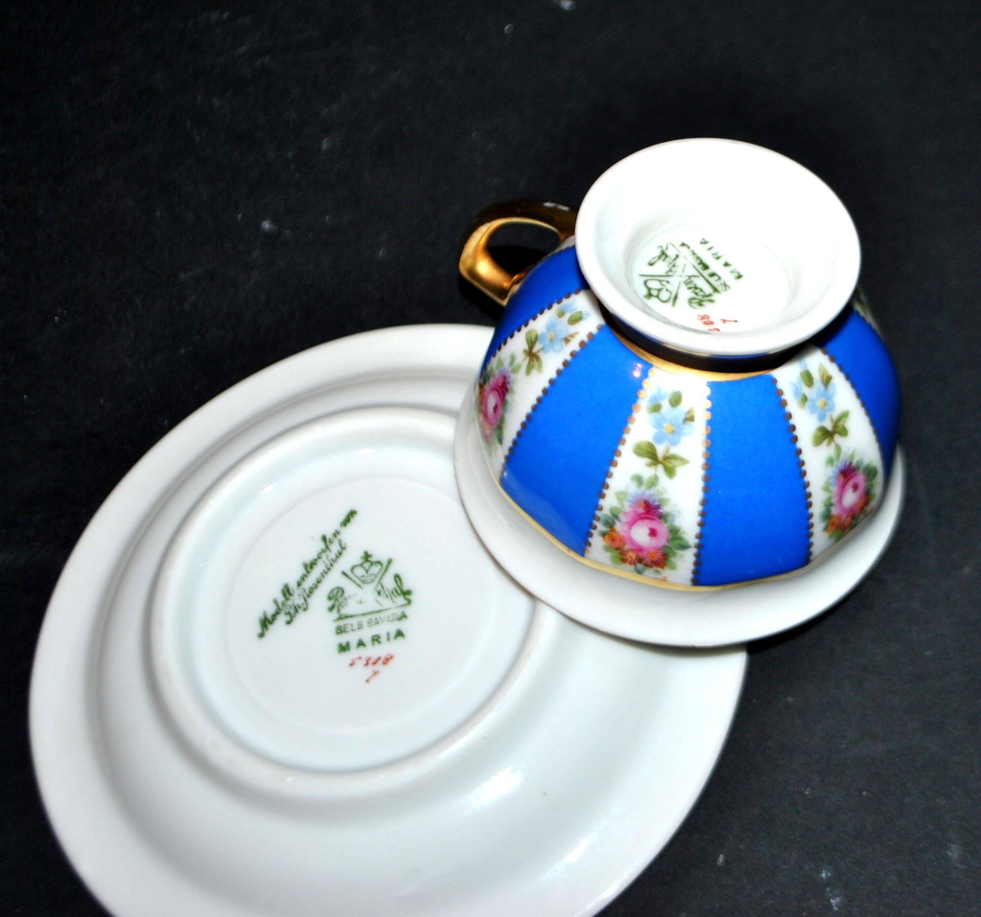 Maria collector's cup in blue and gold German porcelain.
