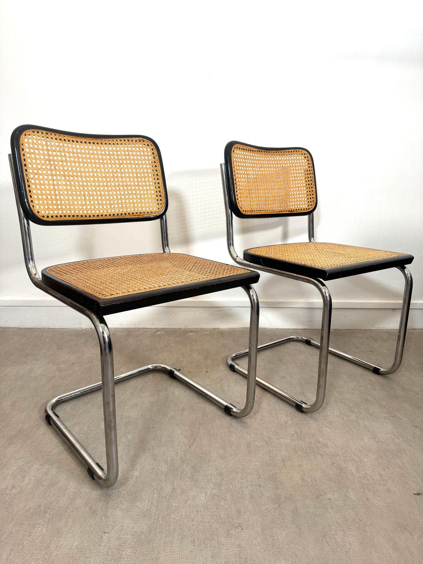 Pair of Marcel Breuer B32 Cesca chairs made in Italy.