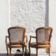 Pair of convertibles caned Louis XV style armchairs