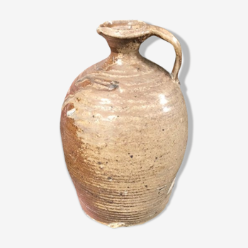 Old varnished sandstone jug