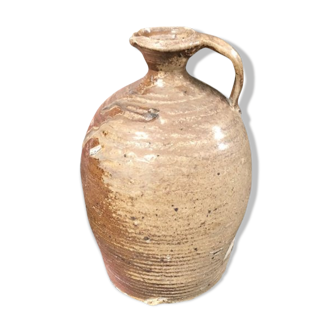 Old varnished sandstone jug