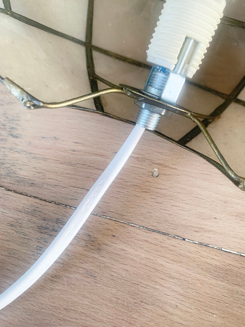 Mother-of-pearl and brass wall lamp