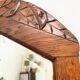 Art Deco oak mirror with carved motif