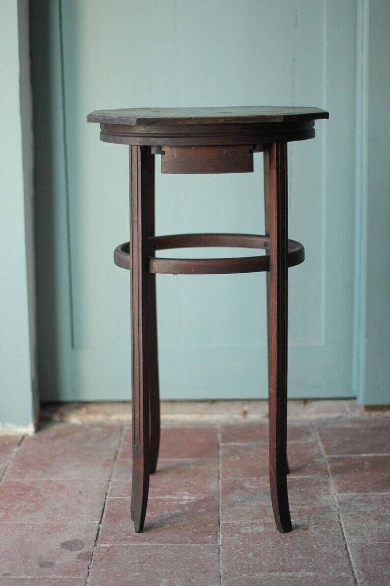 Wooden drawer table or 19th-century work table with a curved wooden stretcher, in the style of Thonet, circa 1900-1920.