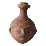 Old anthropomorphic terracotta vase pitcher