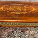 Louis XVI style oval dining table with rosewood marquetry extension mounted in bronze