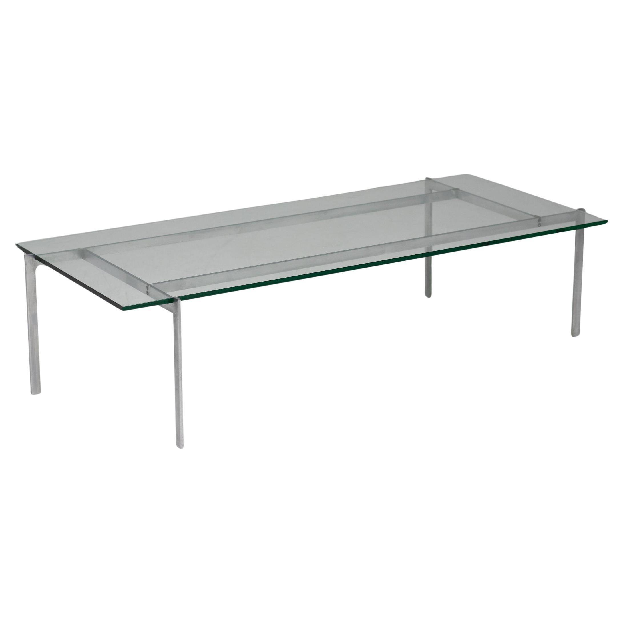 Architectural rectangular coffee table in steel and glass.