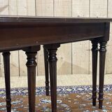 English nesting tables in mahogany and leather top under glass - work from the 1950s