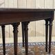 English nesting tables in mahogany and leather top under glass - work from the 1950s