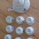 Teapot set and 9 cups with Chinese and French words