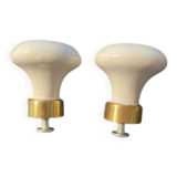 a pair of small antique porcelain and brass knob handles