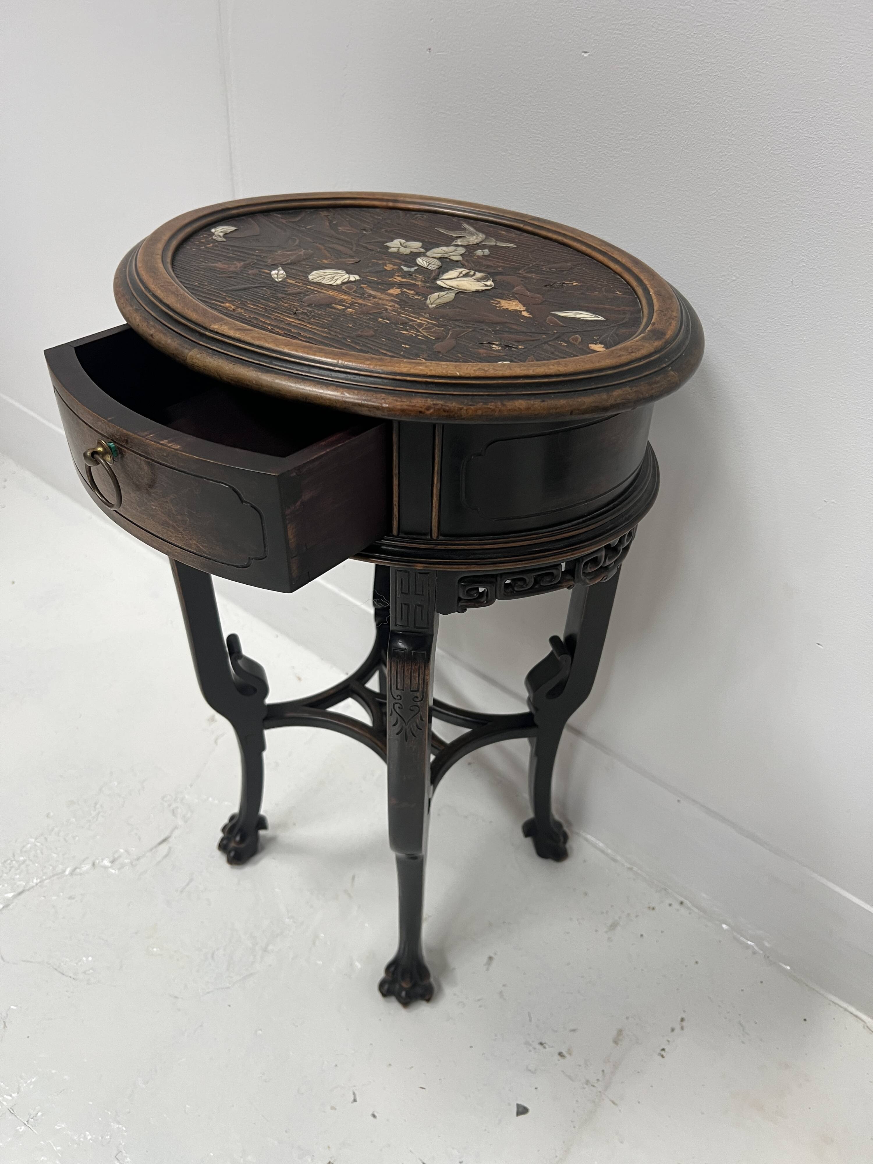 Asian style side table in natural wood, 20th century.
