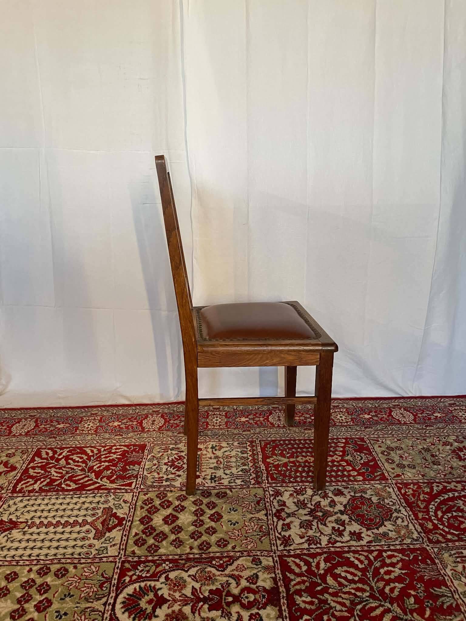 Set of 4 Art Deco chairs in oak and brown leather.