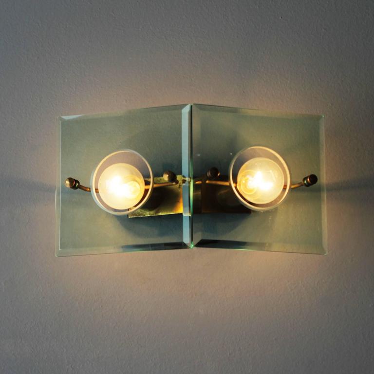 Italian applies in brass and glass cut by Arredoluce