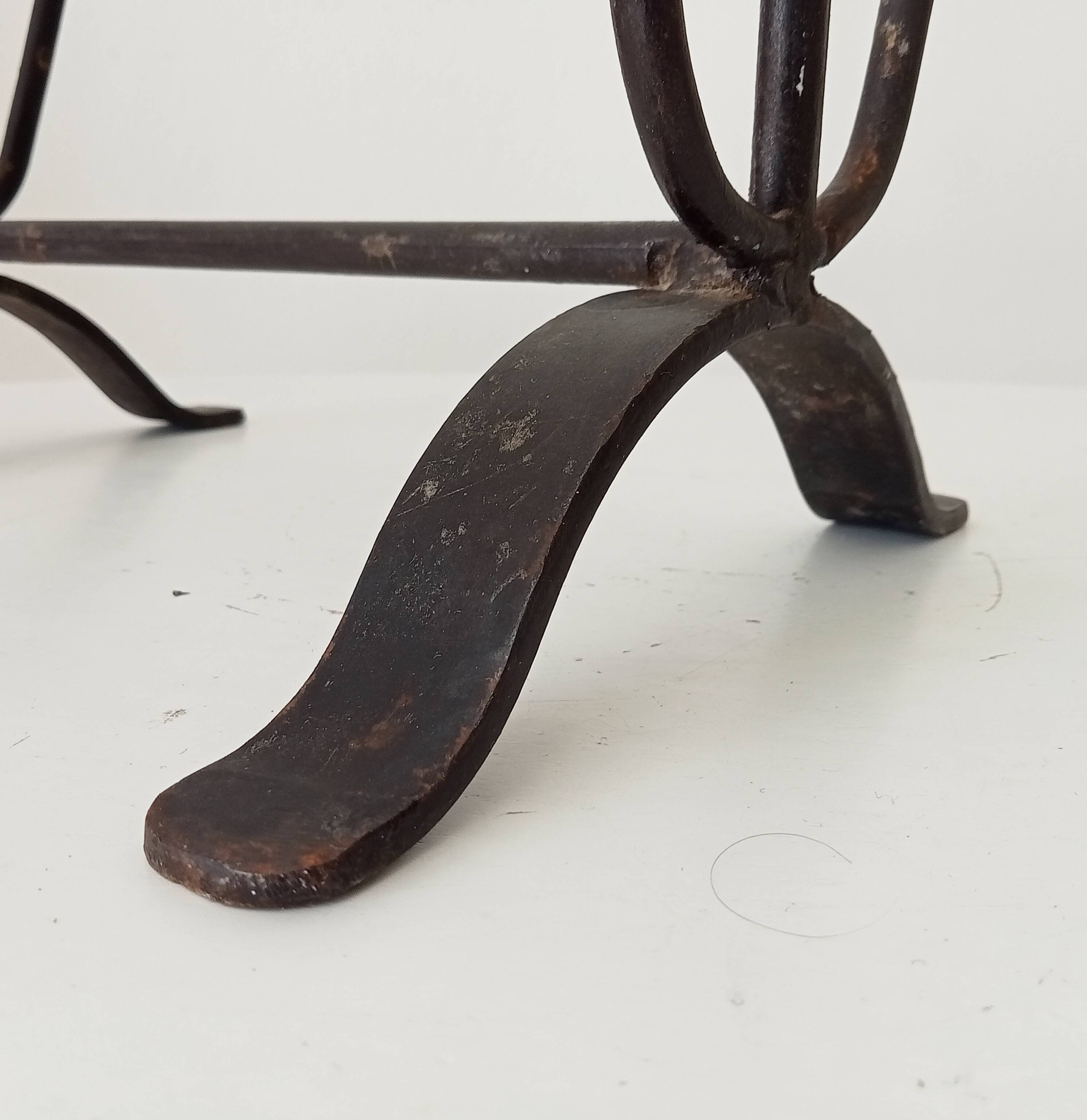 Brutalist wrought iron magazine rack from the 1960s.