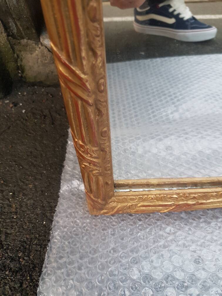 Golden mirror in louis xv style