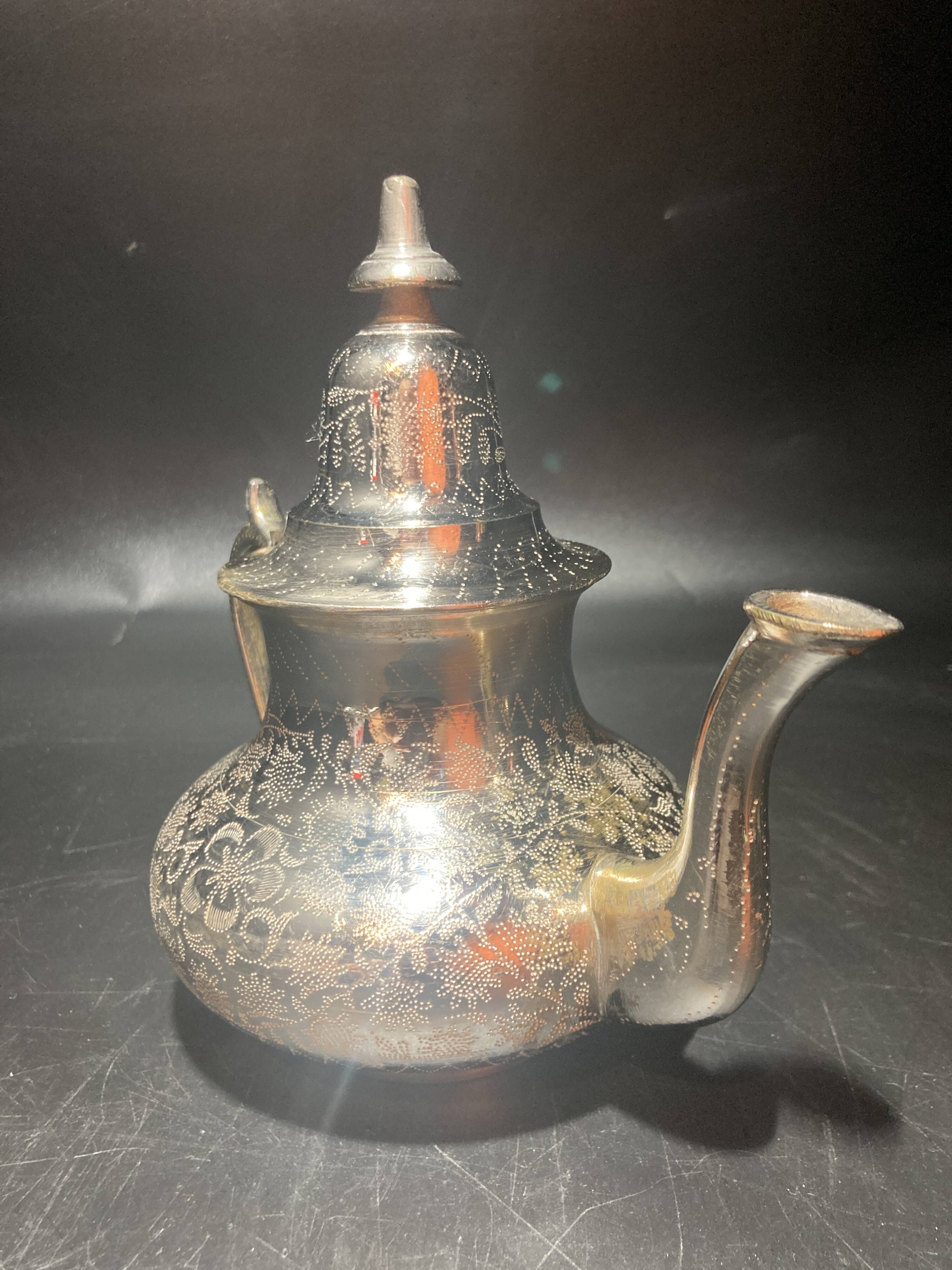 Silver metal teapot