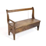 Handcrafted wooden bench with armrest and drawer on the right.