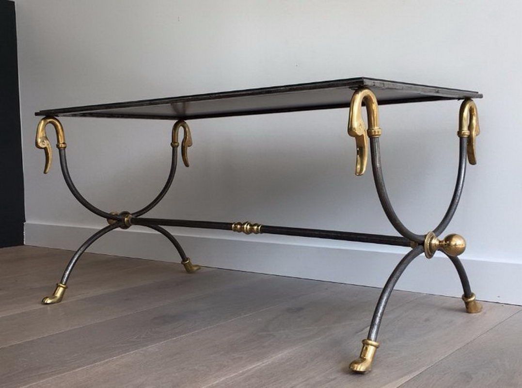 Coffee table in brushed steel and brass