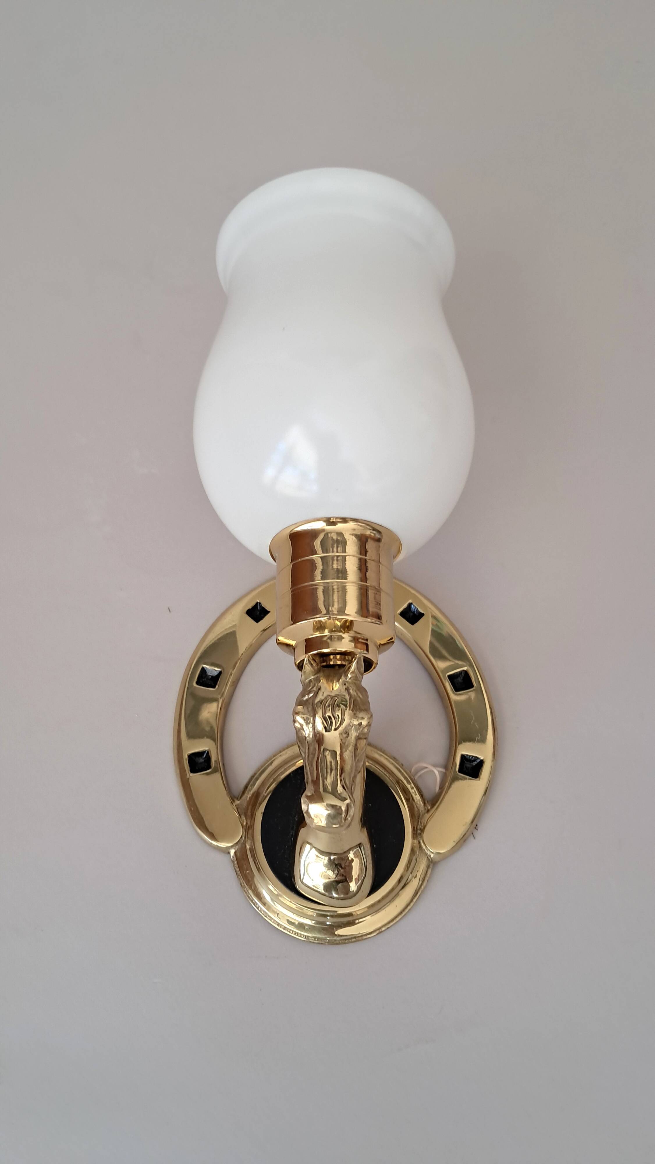 Gilded bronze wall lamp with iron and horse head 1950/1960.