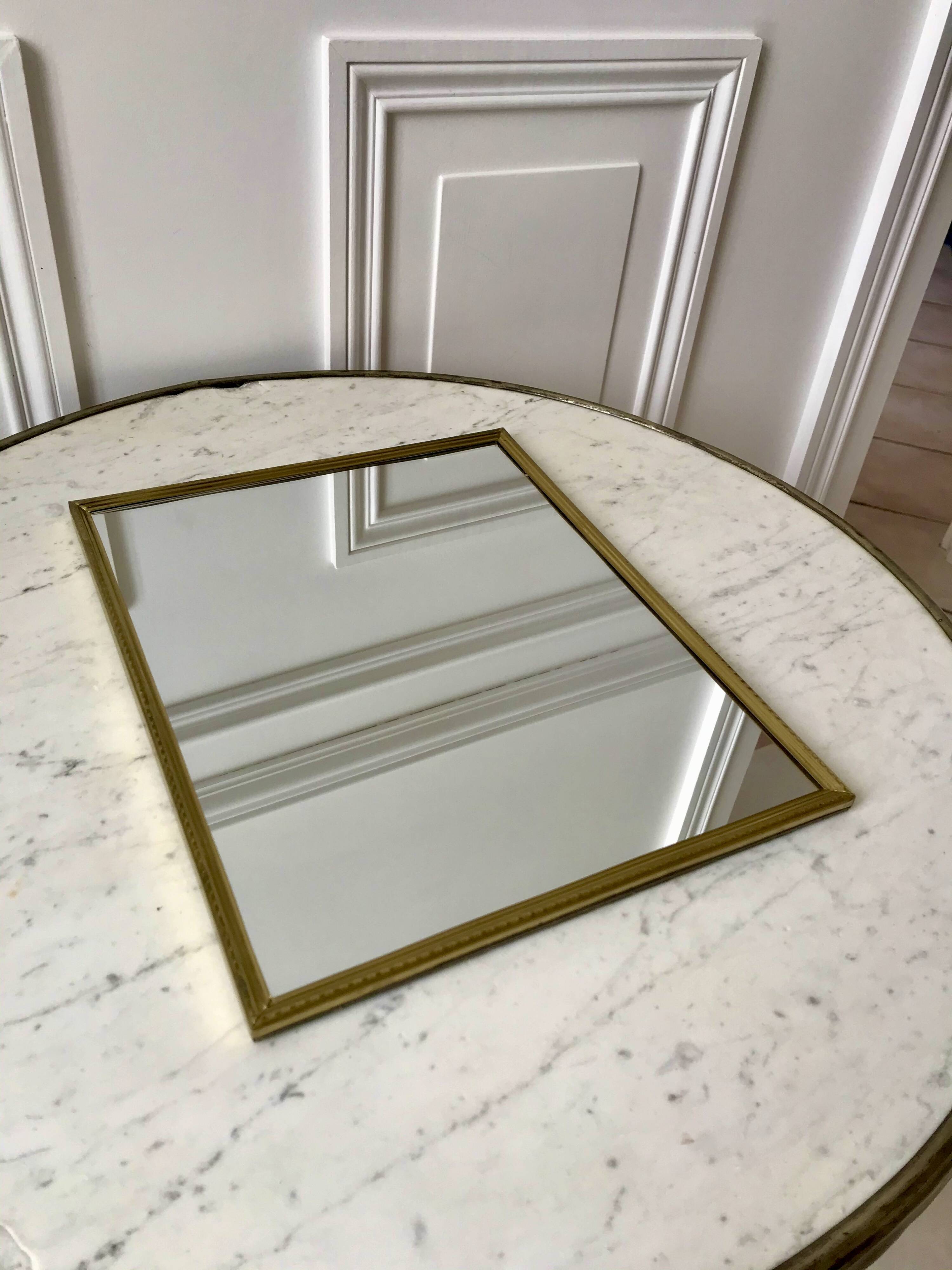Gilded brass mirror from the 40s and 50s