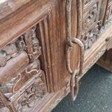 Old wooden console with chains