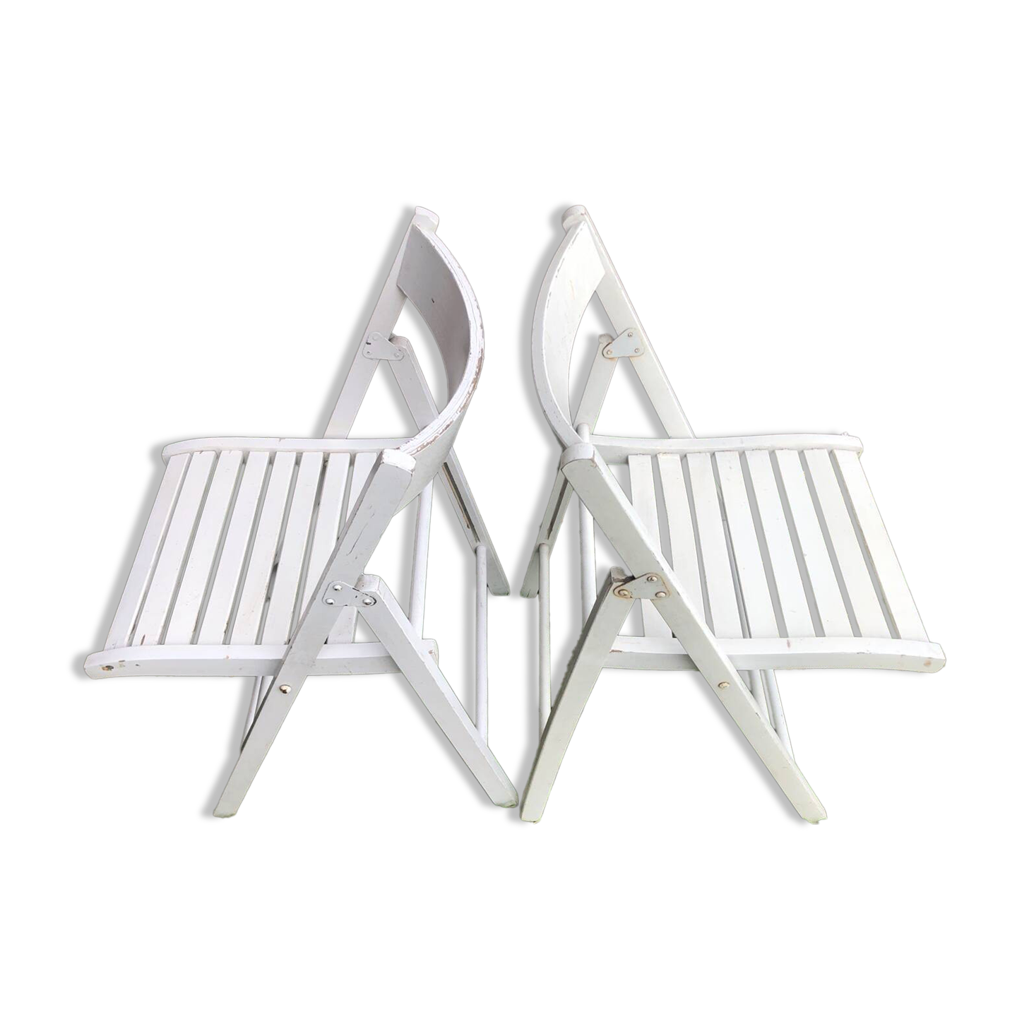 Pair of vintage white wooden folding chairs