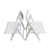 Pair of vintage white wooden folding chairs