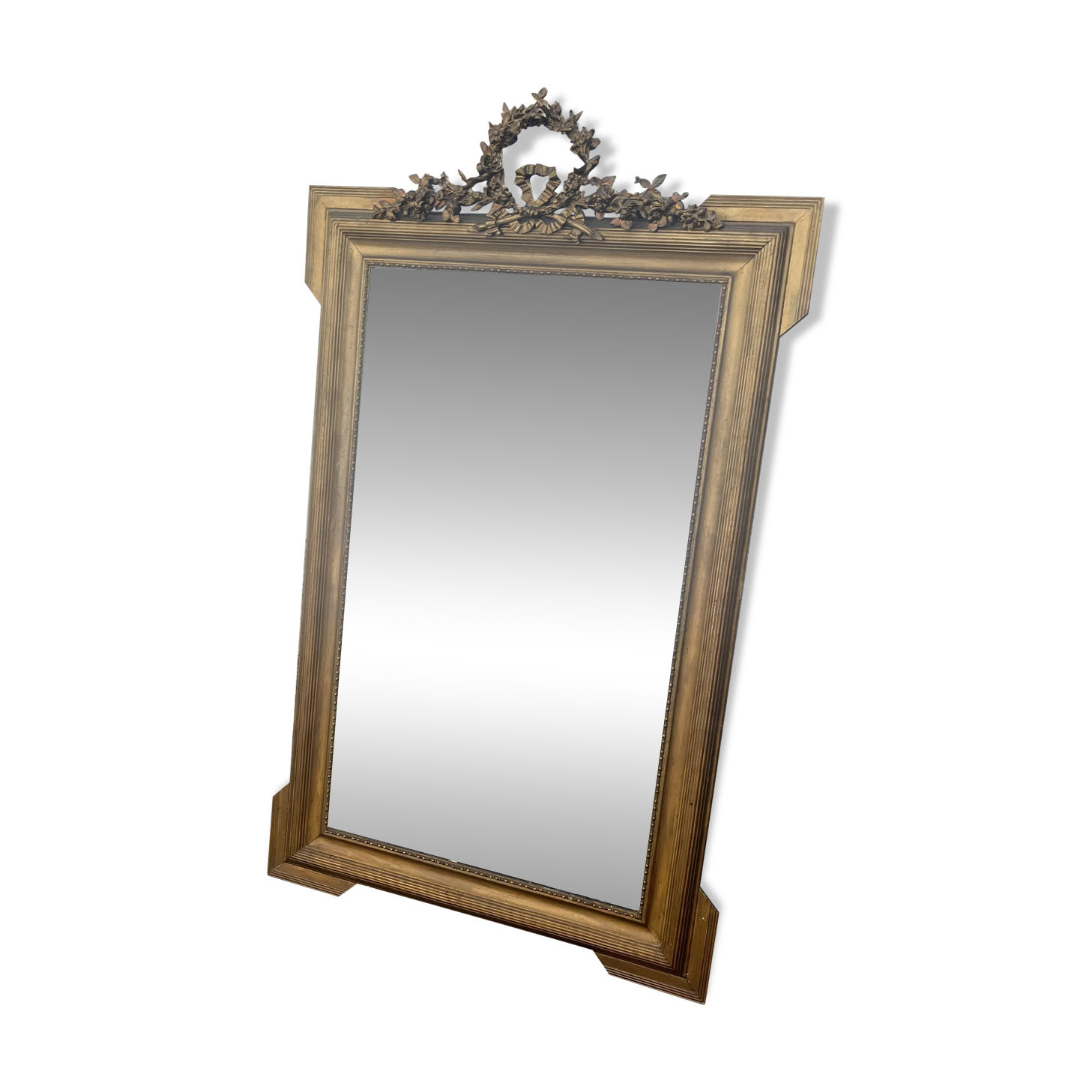 Large antique gilded mirror with carved pediment, 126 cm