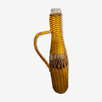 Natural and yellow braided glass and rattan bottle