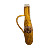 Natural and yellow braided glass and rattan bottle