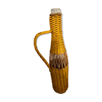 Natural and yellow braided glass and rattan bottle