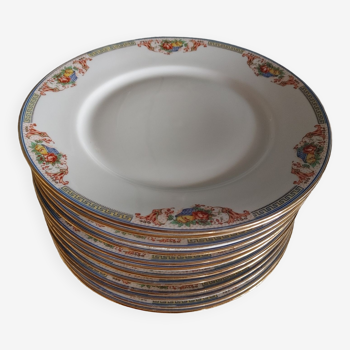 12 Flat plates in Limoges porcelain flower baskets, fruit - early 20th - ø 24,5