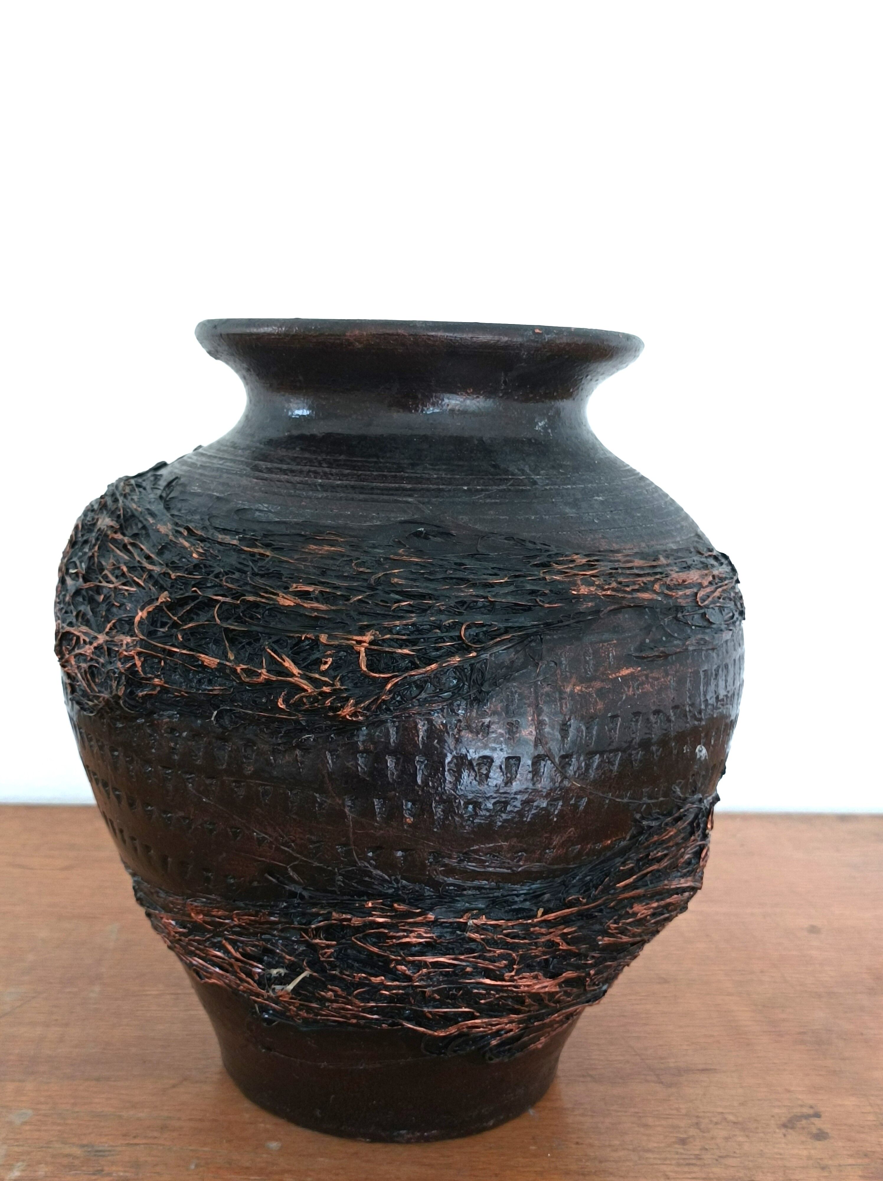 Black varnished terracotta pot