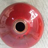 Red enamelled ceramic vase
