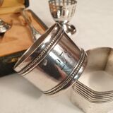 3 shells and 2 silver metal napkin rings