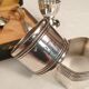 3 shells and 2 silver metal napkin rings