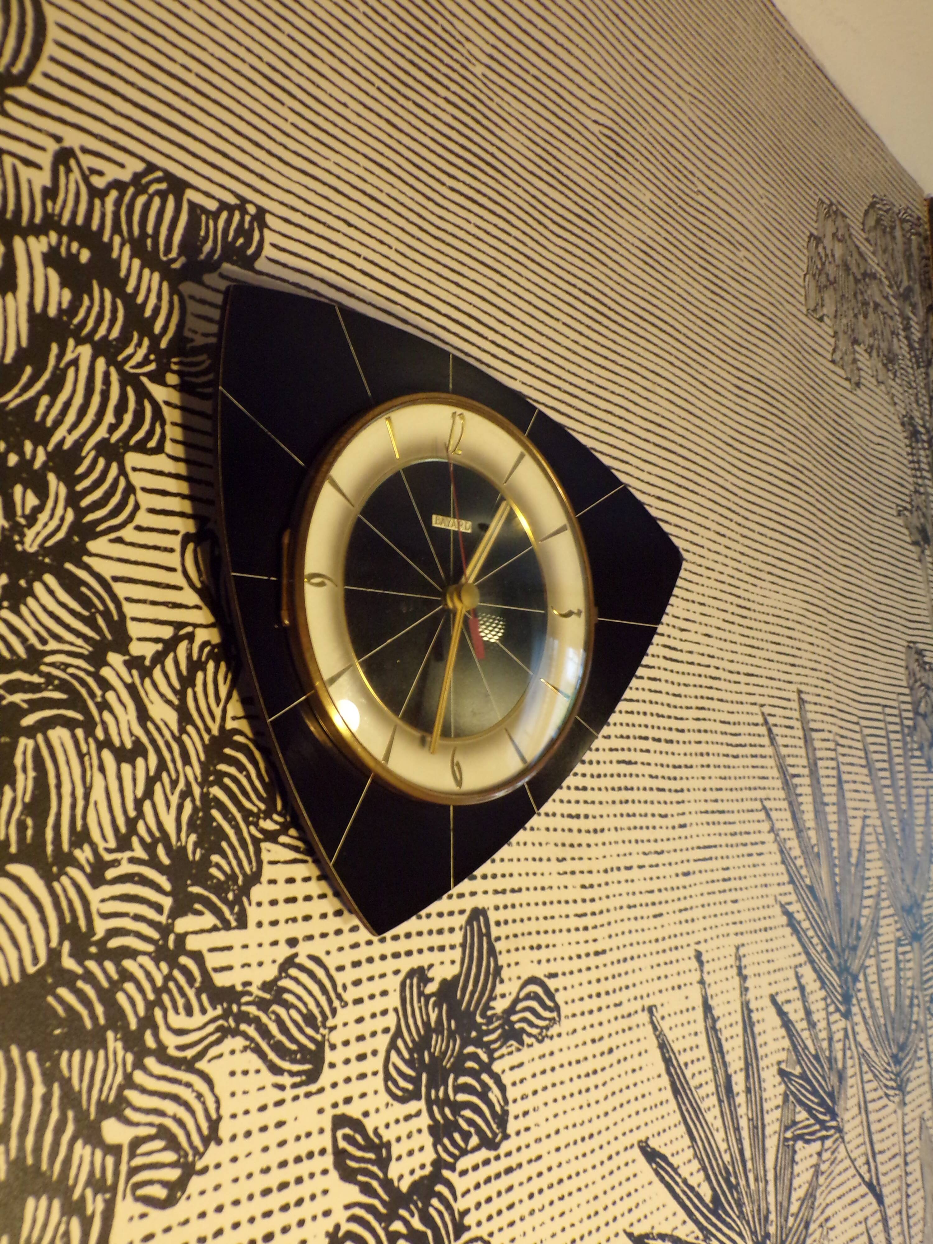 Pendule murale vintage en formica