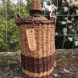 Glass and wicker cylinder