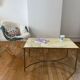 Table basse en marbre et laiton