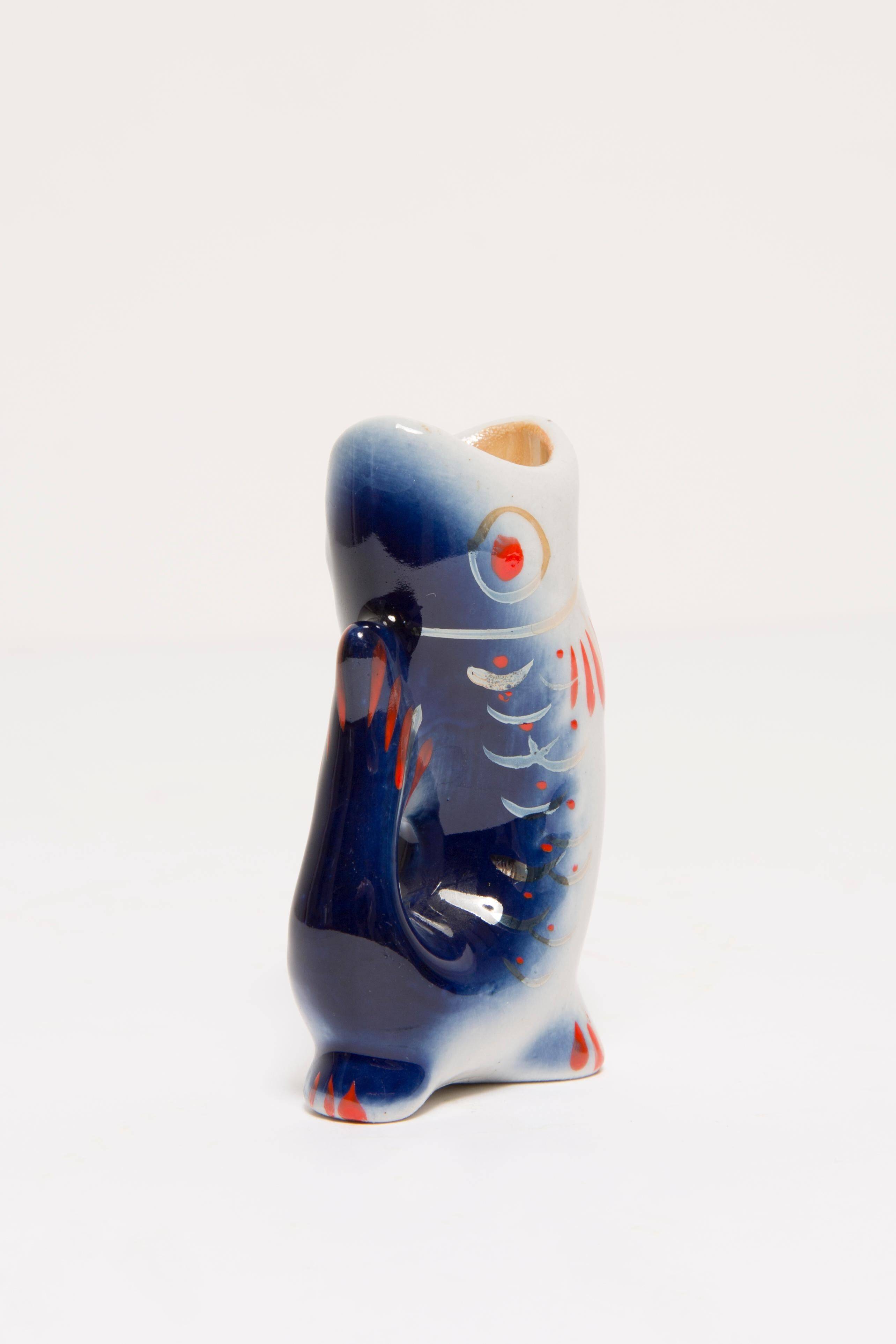 Set of 7 blue glass fish, mid-20th century.