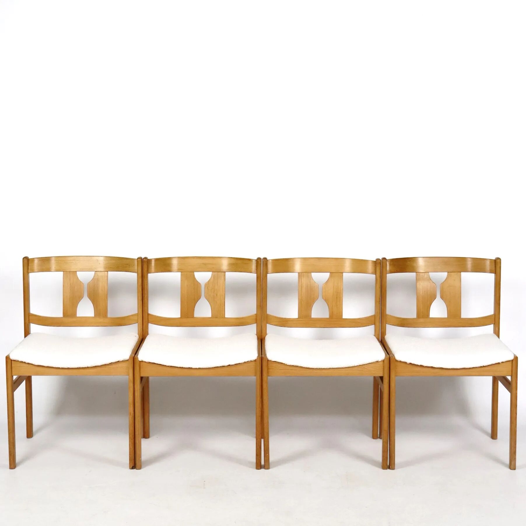 Set of four pine chairs from the 1960s.