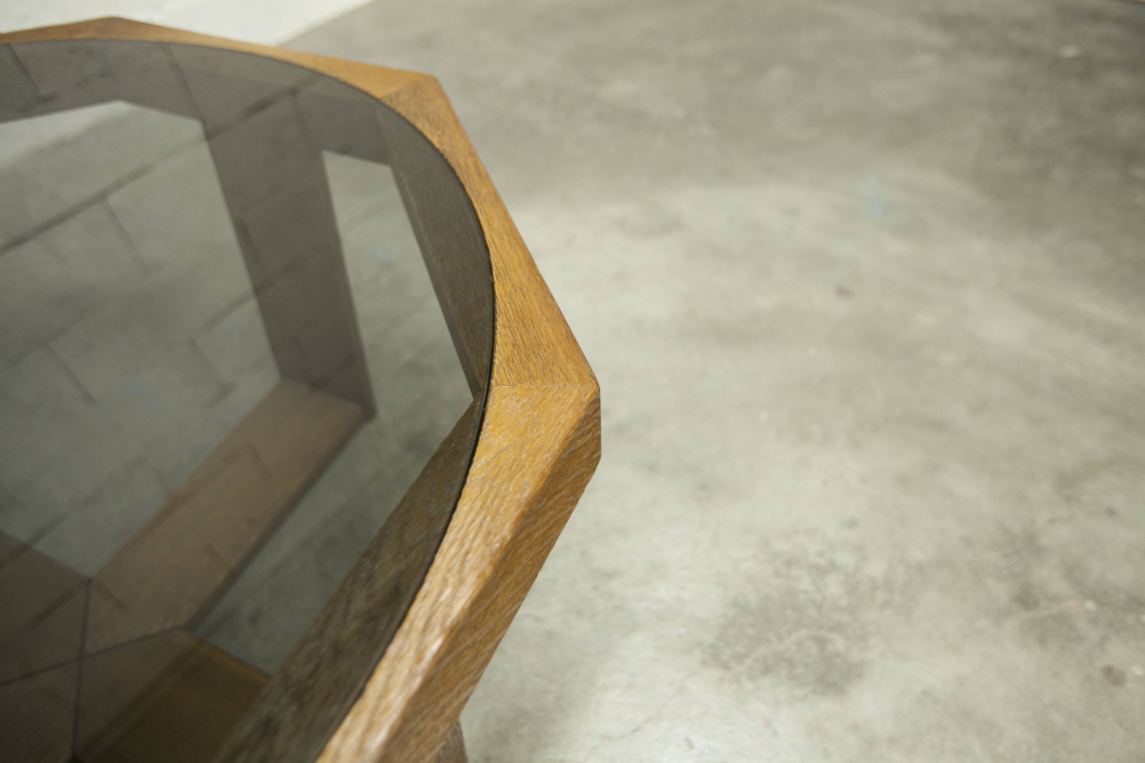 Unique hexagonal table 1977, smoked glass and oak, Swiss made.