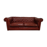 Old red leather Chesterfield sofa