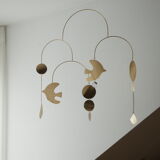 Mobile model Rana . Mobile in abstract brass.