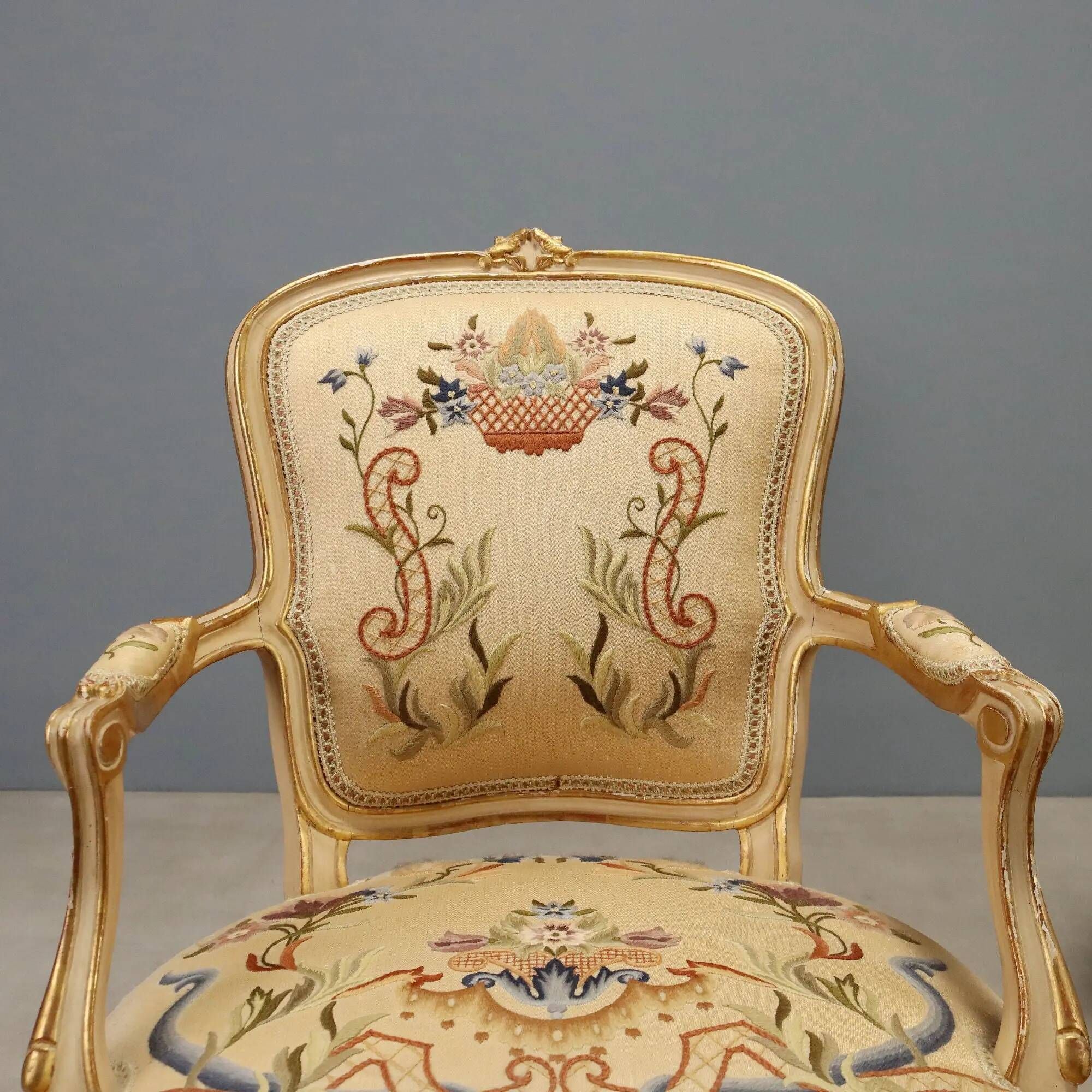 Pair of antique baroque style armchairs in carved wood, Italy, 19th century.