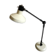 Desk lamp has two articulated metal arms