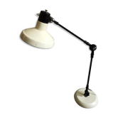 Desk lamp has two articulated metal arms