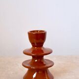 Modern brown colored ceramic candle holder